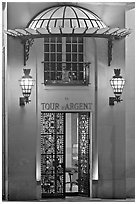 Entrance of the Tour d'Argent restaurant. Quartier Latin, Paris, France (black and white)