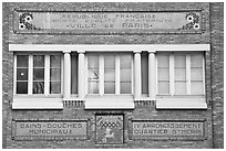 Facade of historic public baths. Paris, France (black and white)