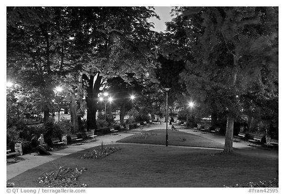 Park on the tip of Ile de la Cite at dusk. Paris, France