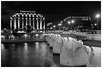 Pont Neuf and Samaritaine illuminated at night. Paris, France (black and white)