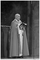 Cardinal of catholic church reading in Notre-Dame. Paris, France ( black and white)