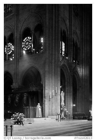Cardinal reading and crossing of Notre-Dame cathedral. Paris, France (black and white)