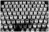 Array of candles, Notre-Dame cathedral. Paris, France ( black and white)