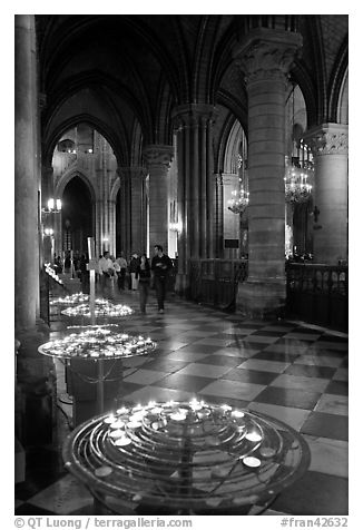 Candles in aisle, Notre-Dame-de-Paris. Paris, France (black and white)