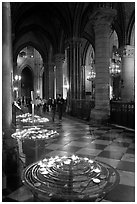 Candles in aisle, Notre-Dame-de-Paris. Paris, France (black and white)
