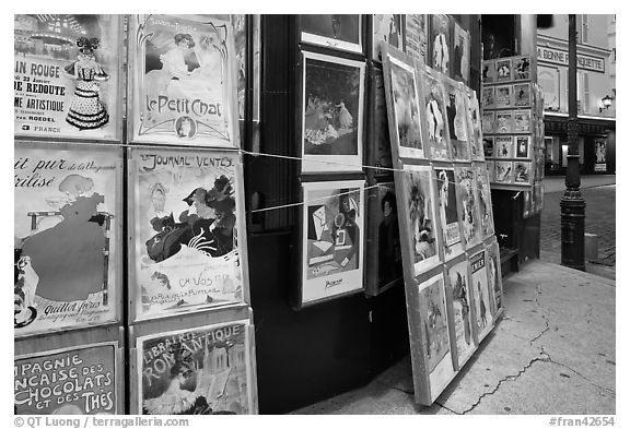 Reproduction of period posters for sale, Montmartre. Paris, France (black and white)