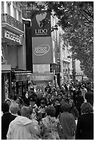 Pedestrians on a Champs-Elysees sidewalk. Paris, France ( black and white)