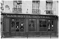 Old Bar hotel and rainbow flag. Paris, France (black and white)