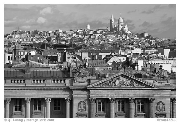 Classical building, Rooftops and Butte Montmartre. Paris, France