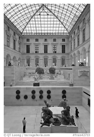 Tourists in the Louvre museum. Paris, France (black and white)