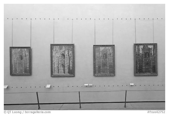 Monet's impressionist paintings of the Rouen Cathedral, Musee d'Orsay. Paris, France (black and white)