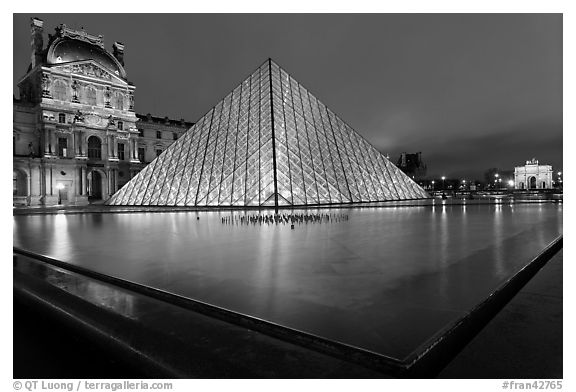 IM Pei Pyramid and reflection ponds at night, The Louvre. Paris, France (black and white)