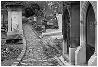 Monumental tombs in Pere Lachaise cemetery. Paris, France (black and white)