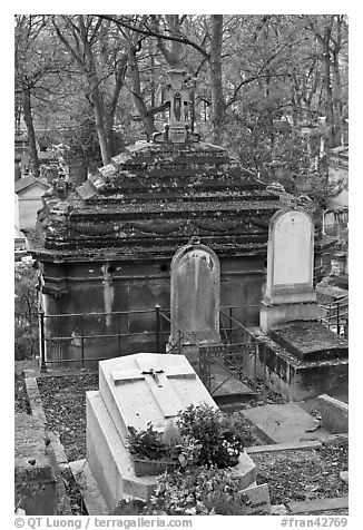 Mossy tombs, Pere Lachaise cemetery. Paris, France (black and white)