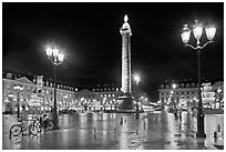 Place Vendome glistening at night. Paris, France (black and white)