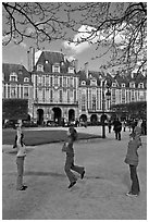 Girls playing with rope, Place des Vosges. Paris, France (black and white)