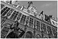 Statue Science by Jules Blanchard and Hotel de Ville at sunset. Paris, France (black and white)