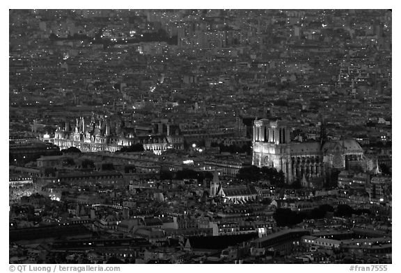 Hotel de Ville (City Hall) and Notre Dame seen from the Montparnasse Tower, dusk. Paris, France (black and white)