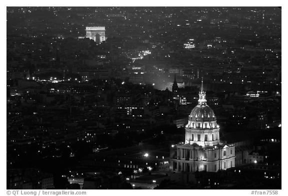 Aerial view of Arc de Triomphe and Invalides by night. Paris, France (black and white)