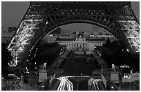 Ecole Militaire (Military Academy) seen through Tour Eiffel  at dusk. Paris, France (black and white)