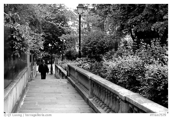 Alley borded by gardens, Montmartre. Paris, France (black and white)