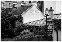 Au Lapin Agile, a famous historic cabaret, Montmartre. Paris, France (black and white)