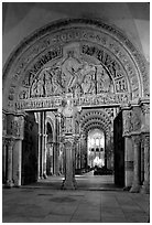 Sculpted Doors and tymphanum inside the Romanesque church of Vezelay. Burgundy, France (black and white)