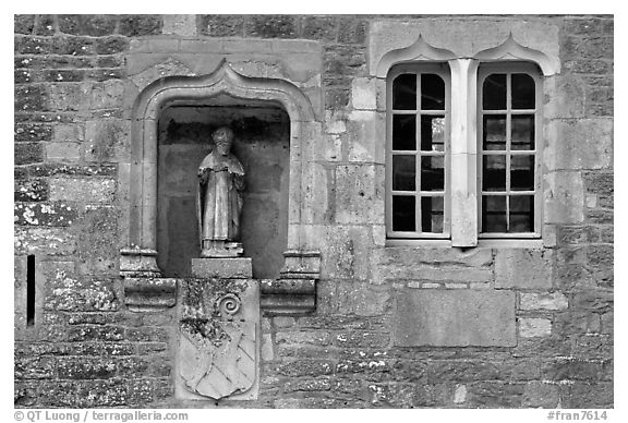 Statue and window, Fontenay Abbey. Burgundy, France (black and white)
