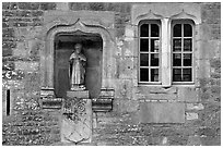 Statue and window, Fontenay Abbey. Burgundy, France (black and white)