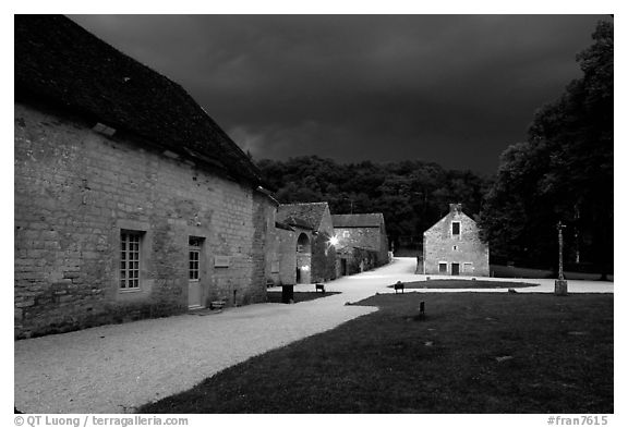 Gardens, approaching evening storm, Fontenay Abbey. Burgundy, France (black and white)