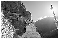 Chorten, prayer flag, and Phuktal Gompa, Zanskar, Jammu and Kashmir. India ( black and white)