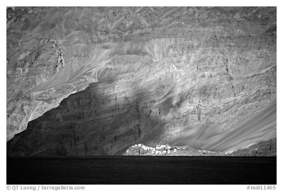 Monastary at the base of tall cliffs, Zanskar, Jammu and Kashmir. India (black and white)