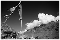 Prayer flag and cloud-capped peak, Himachal Pradesh. India (black and white)