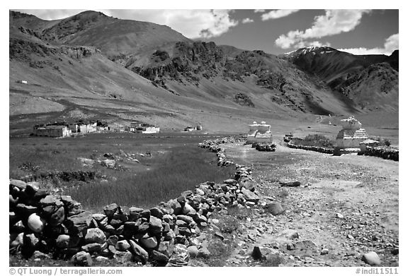 Stone fence, chortens, cultivations, and village, Zanskar, Jammu and Kashmir. India (black and white)