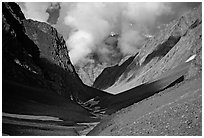 Valley with high cliffs and clouds, Zanskar, Jammu and Kashmir. India (black and white)