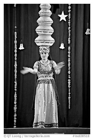 Rajasthani dancer with balanced jars. New Delhi, India