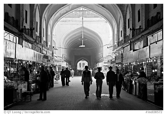 Shops in Chatta Chowk (Covered Bazar), Red Fort. New Delhi, India (black and white)