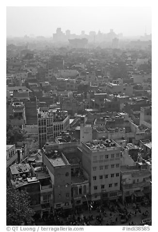 View of Old Delhi from above with high rise skyline in back. New Delhi, India (black and white)