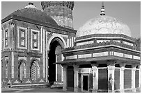 Tomb of Imam Zamin, Alai Darweza gate, and base of  Qutb Minar. New Delhi, India (black and white)