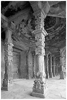 Colums around Quwwat-ul-Islam mosque, Qutb complex. New Delhi, India (black and white)