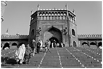 Muslim worshippers climbing  Jama Masjid South Gate. New Delhi, India (black and white)