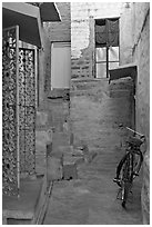 Blue alley with bicycle. Jodhpur, Rajasthan, India (black and white)