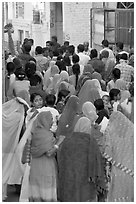 Narrow street filled by wedding procession. Jodhpur, Rajasthan, India ( black and white)