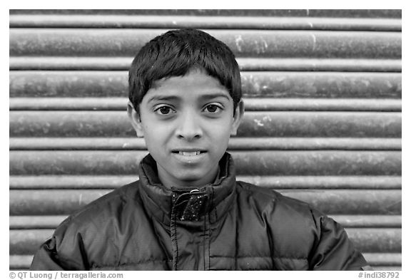 Boy with insulated jacket. Jodhpur, Rajasthan, India (black and white)