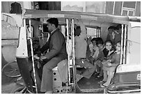 Rickshaw transporting schoolchildren. Jodhpur, Rajasthan, India (black and white)