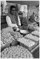 Man selling sweets and pastries. Jodhpur, Rajasthan, India ( black and white)