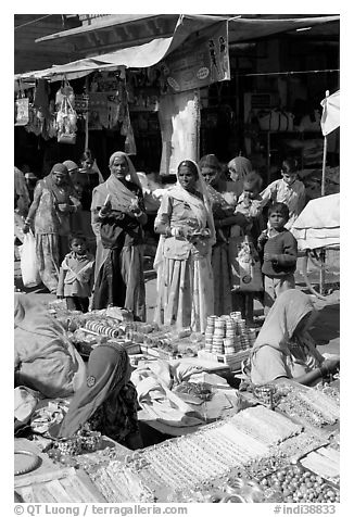 Women looking at jewelry stand in Sardar market. Jodhpur, Rajasthan, India