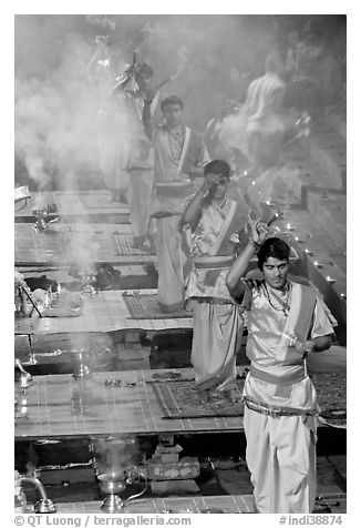 Five young Brahmans performing puja ceremony in the evening. Varanasi, Uttar Pradesh, India