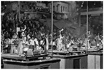 Brahmans performing evening arti ceremony. Varanasi, Uttar Pradesh, India (black and white)