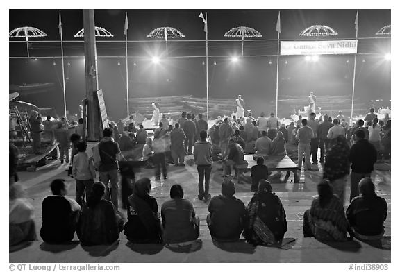 Worshipers attending arti ceremony at Ganga Seva Nidhi. Varanasi, Uttar Pradesh, India (black and white)